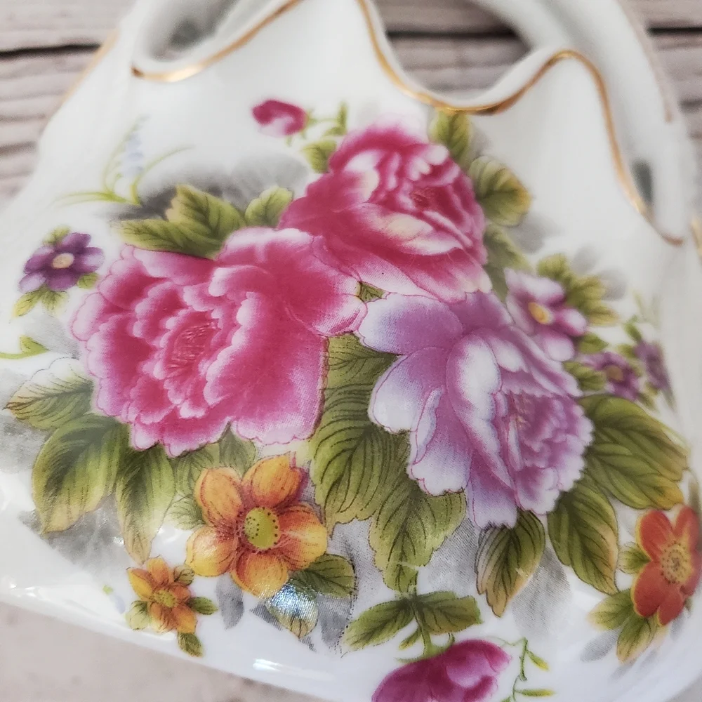 Vintage porcelain basket with flowers on it white, pink, purple, green